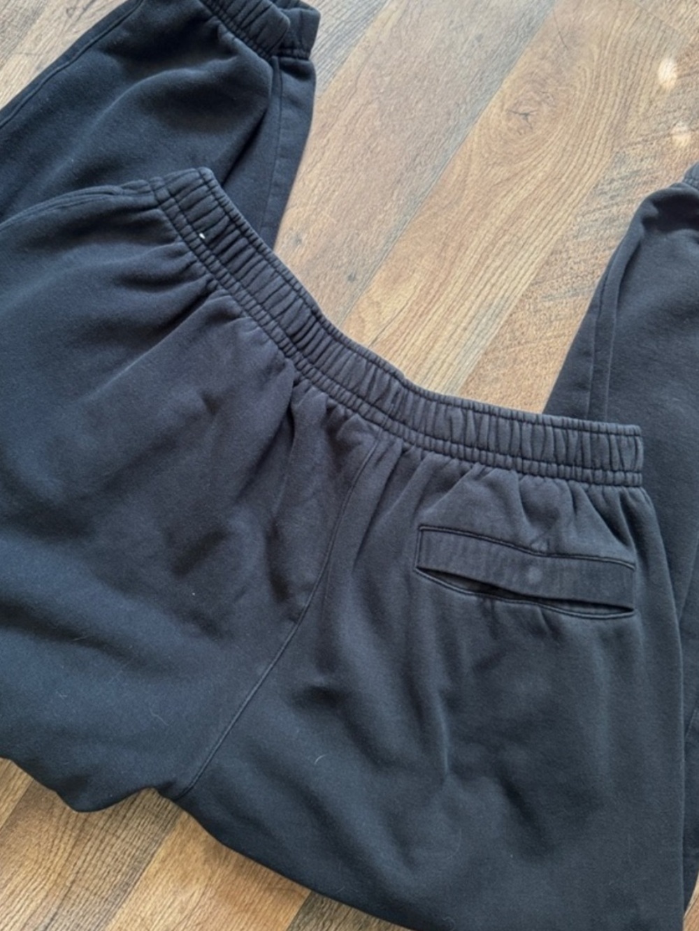 Nike Black Men’s Joggers with White Swoosh and Cuffed Bottoms - Picture 2 of 3